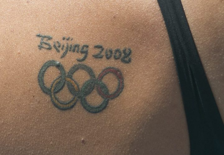 Calling All Swimmers With The Olympic Rings Tattoo